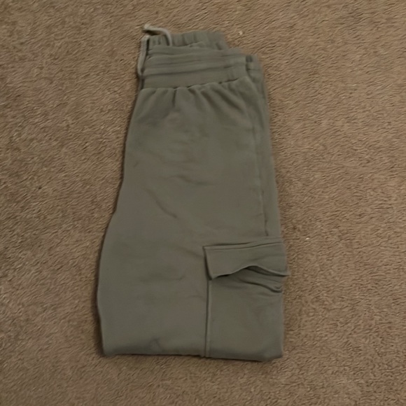 These are olive green sweatpants from ambiance in a size small. - Picture 2 of 3